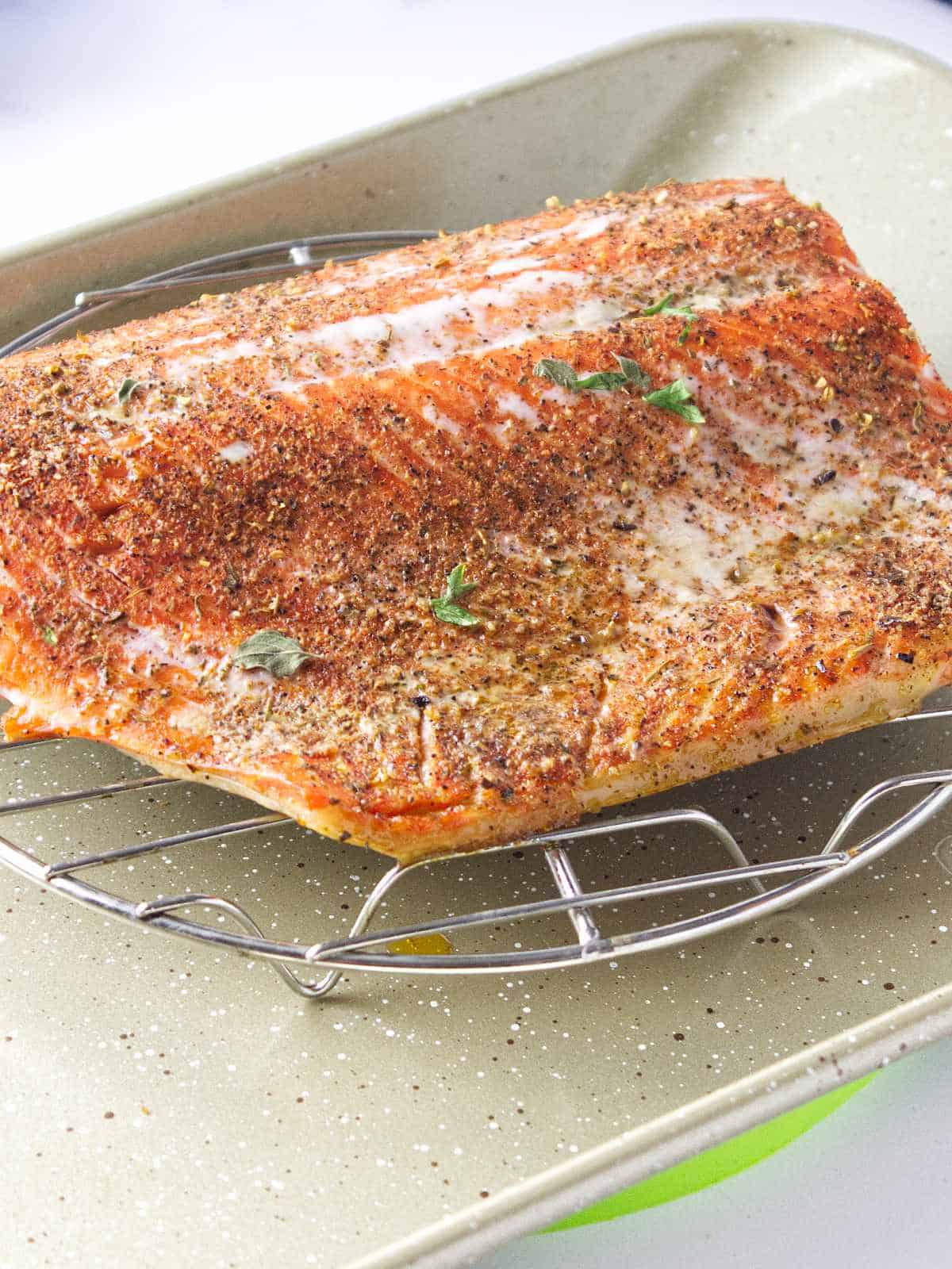 cooked salmon filet on a baking rack.