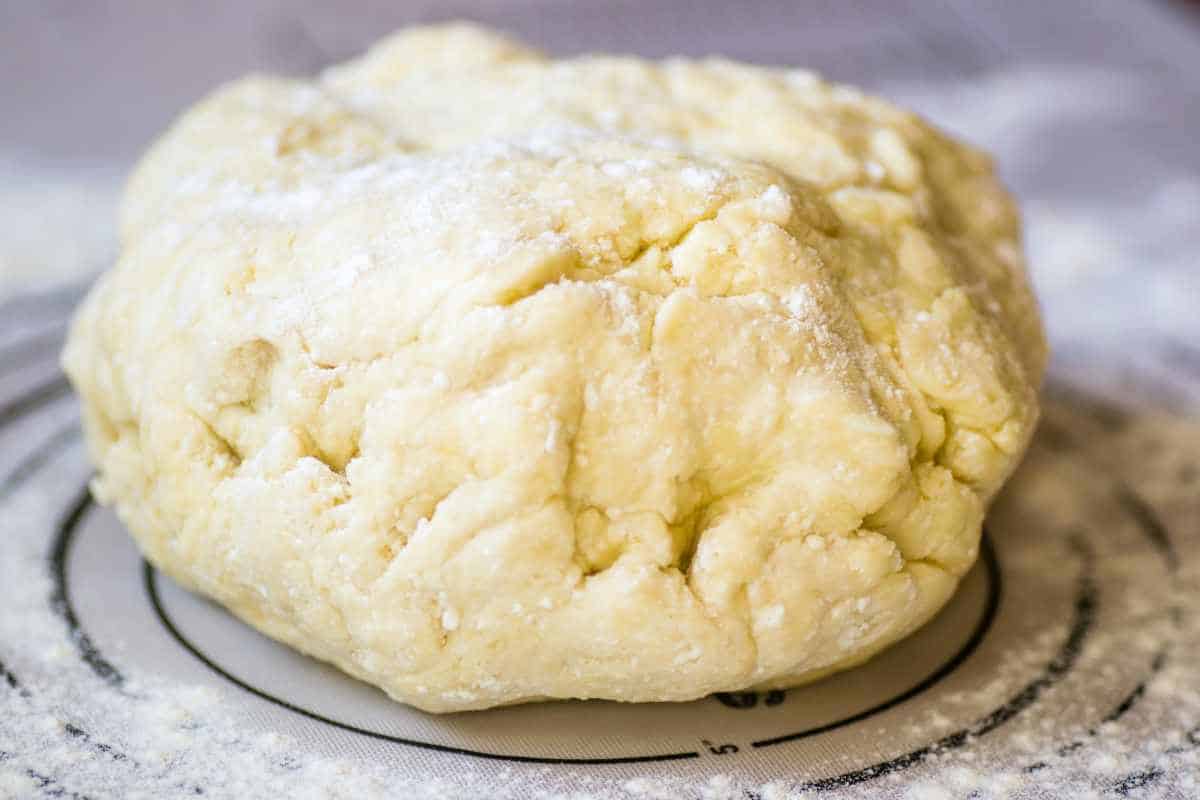 ball of dough on floured surface.
