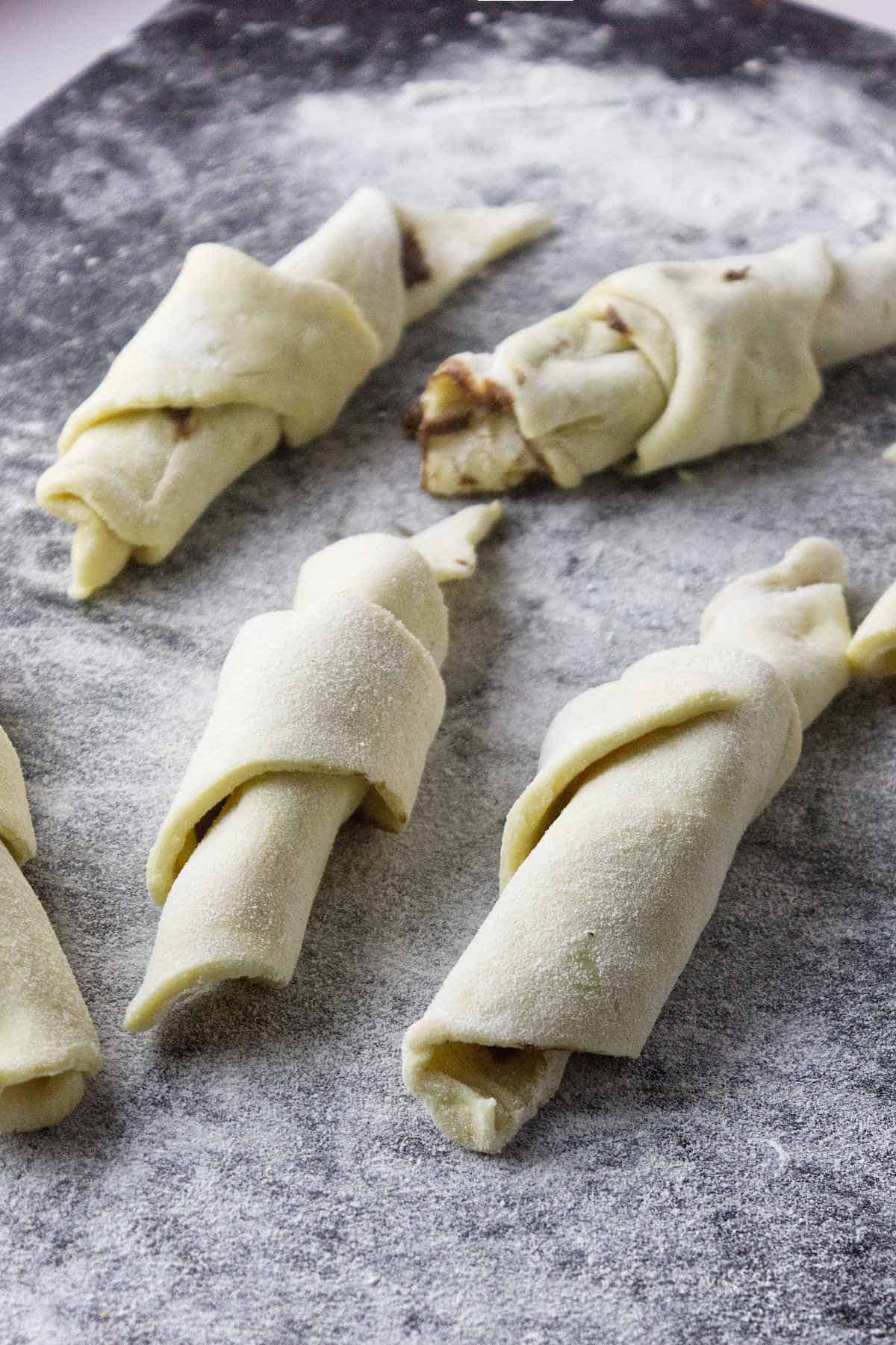 puff pastry rolled up with filling inside.
