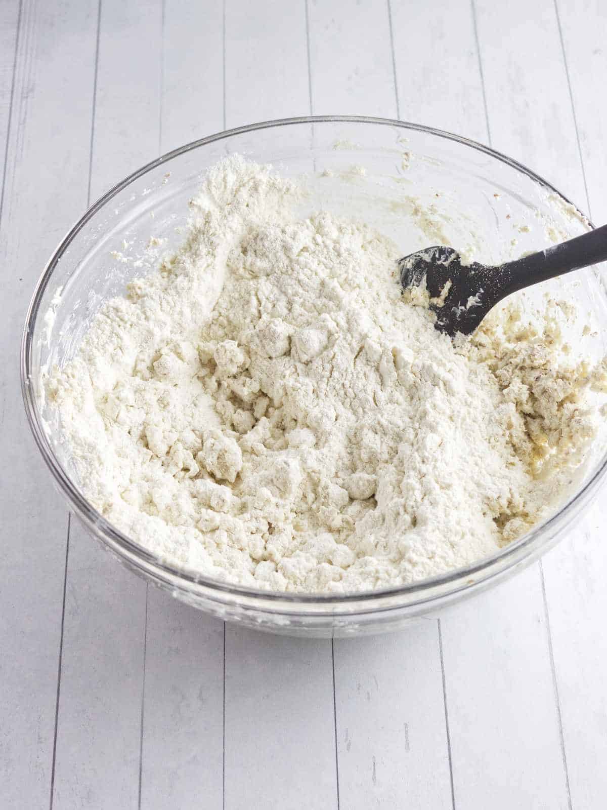 flour added to bowl of creamed butter and sugar.