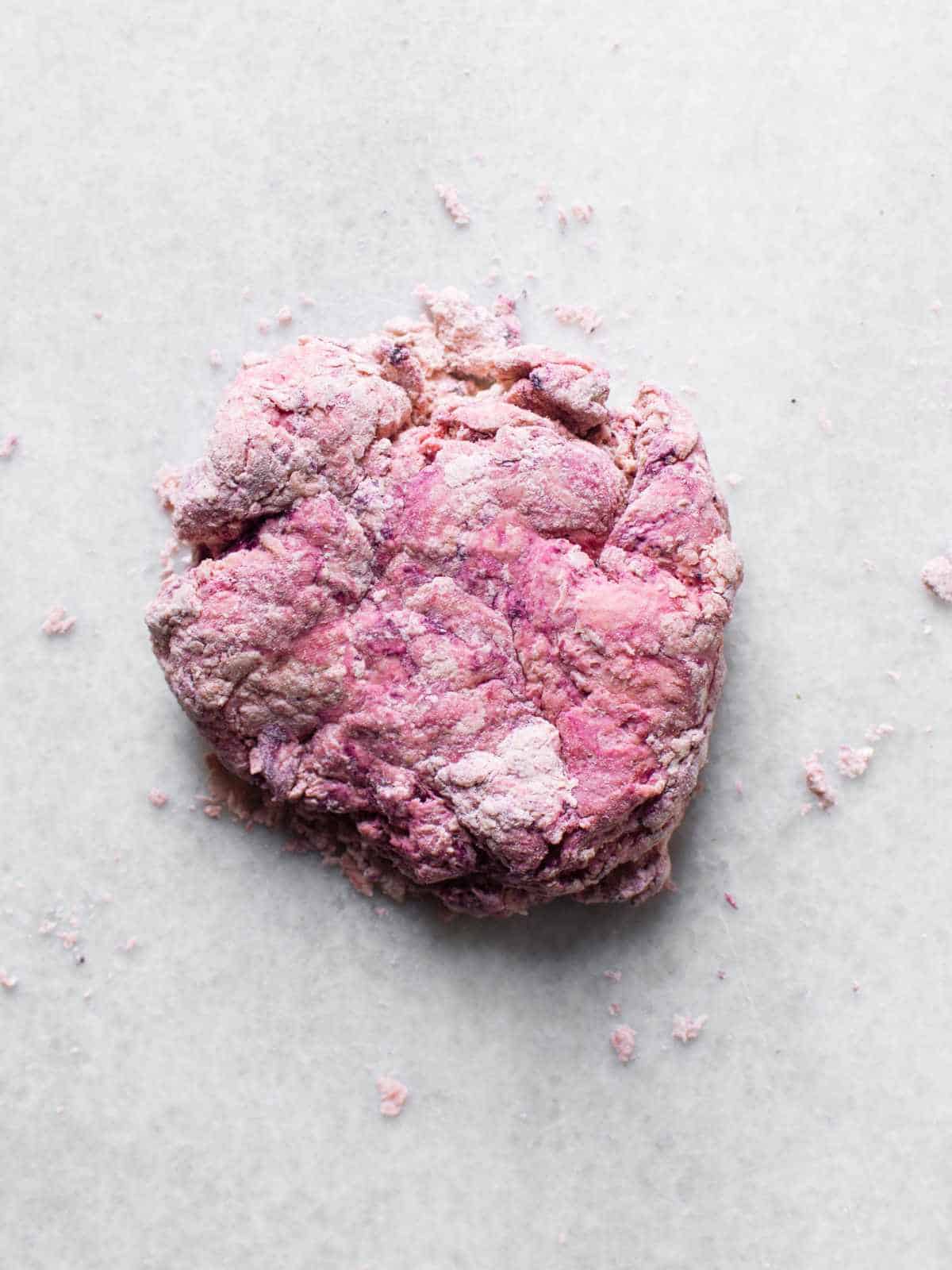dough being tinted pink.