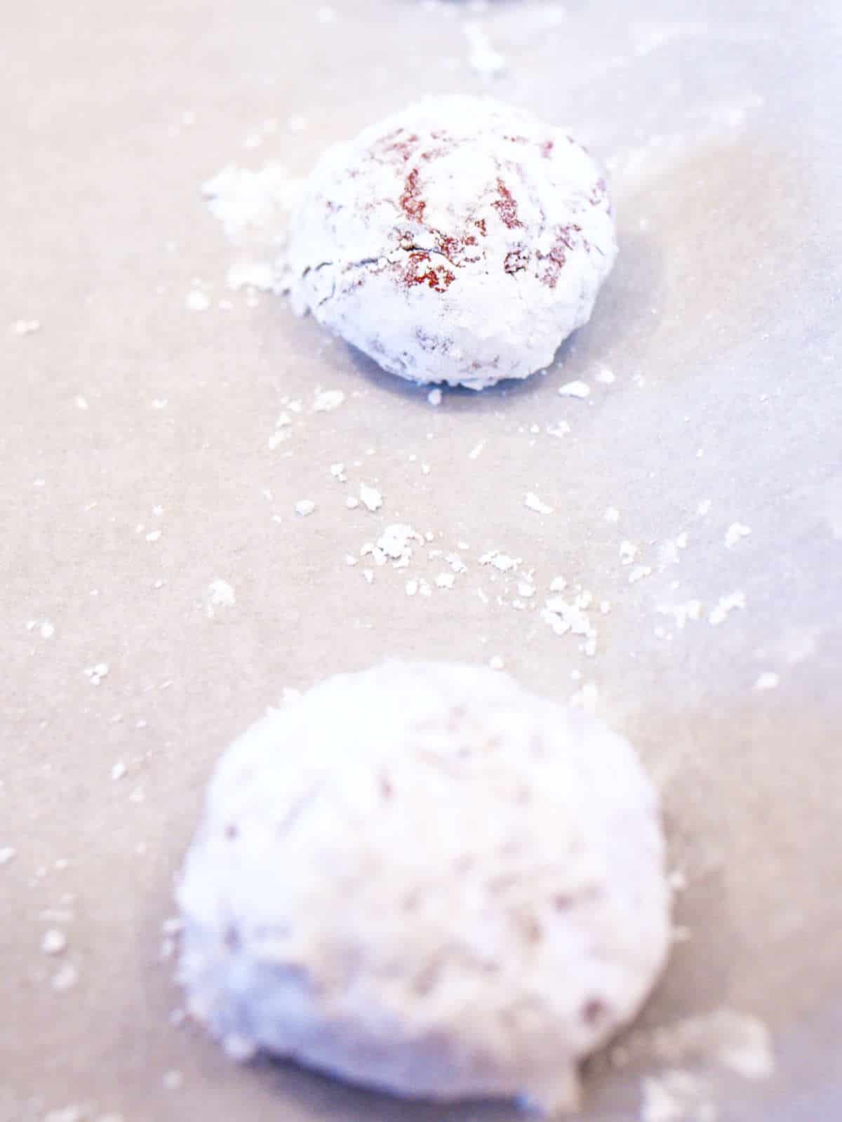 balls of cookie dough rolled in powdered sugar.