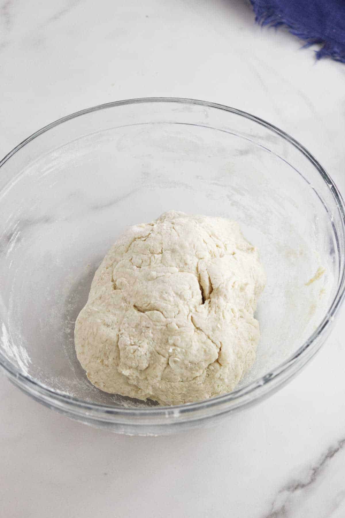 dough in a bowl ready to proof.