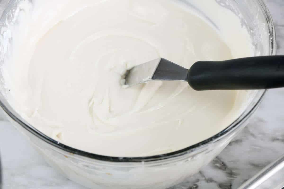 white icing prepared in a bowl.