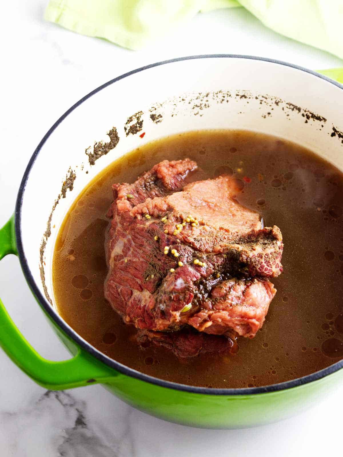 cooked beef in a pot.