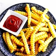 plate of Ore-ida golden brown crinkle fries.