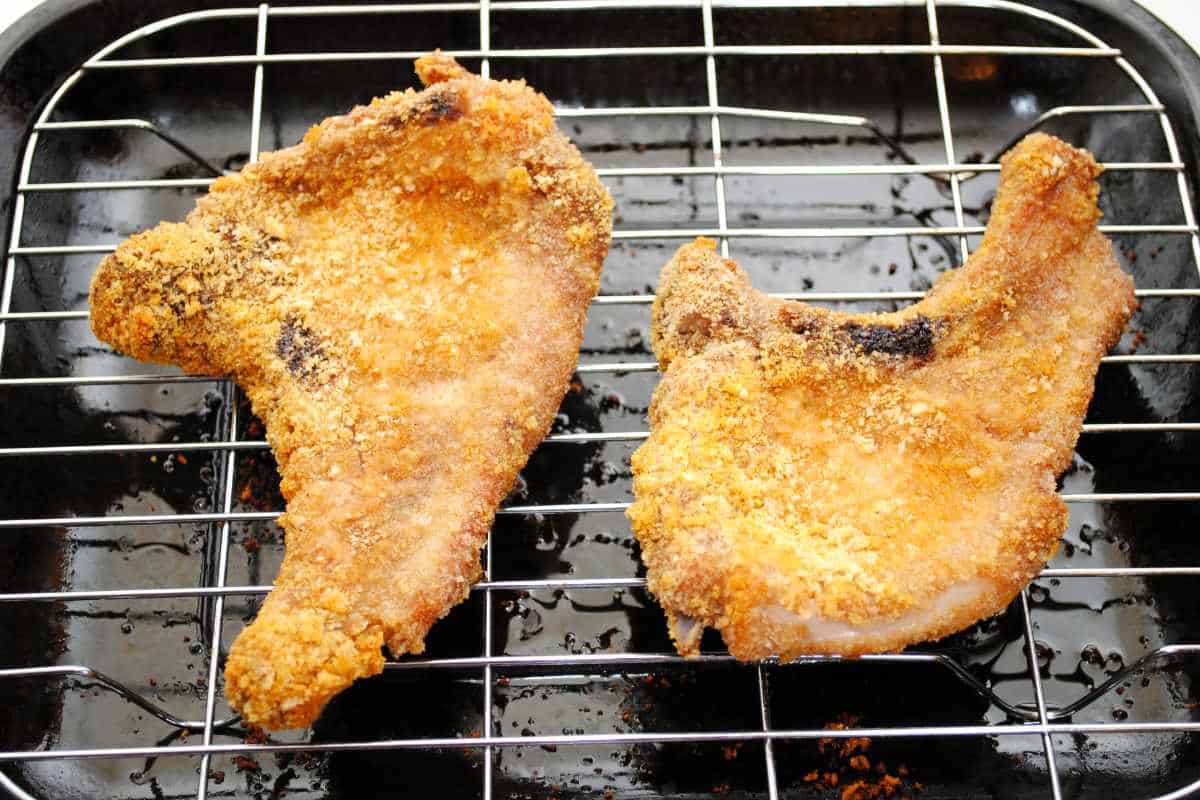 two crispy air fried pork chops.