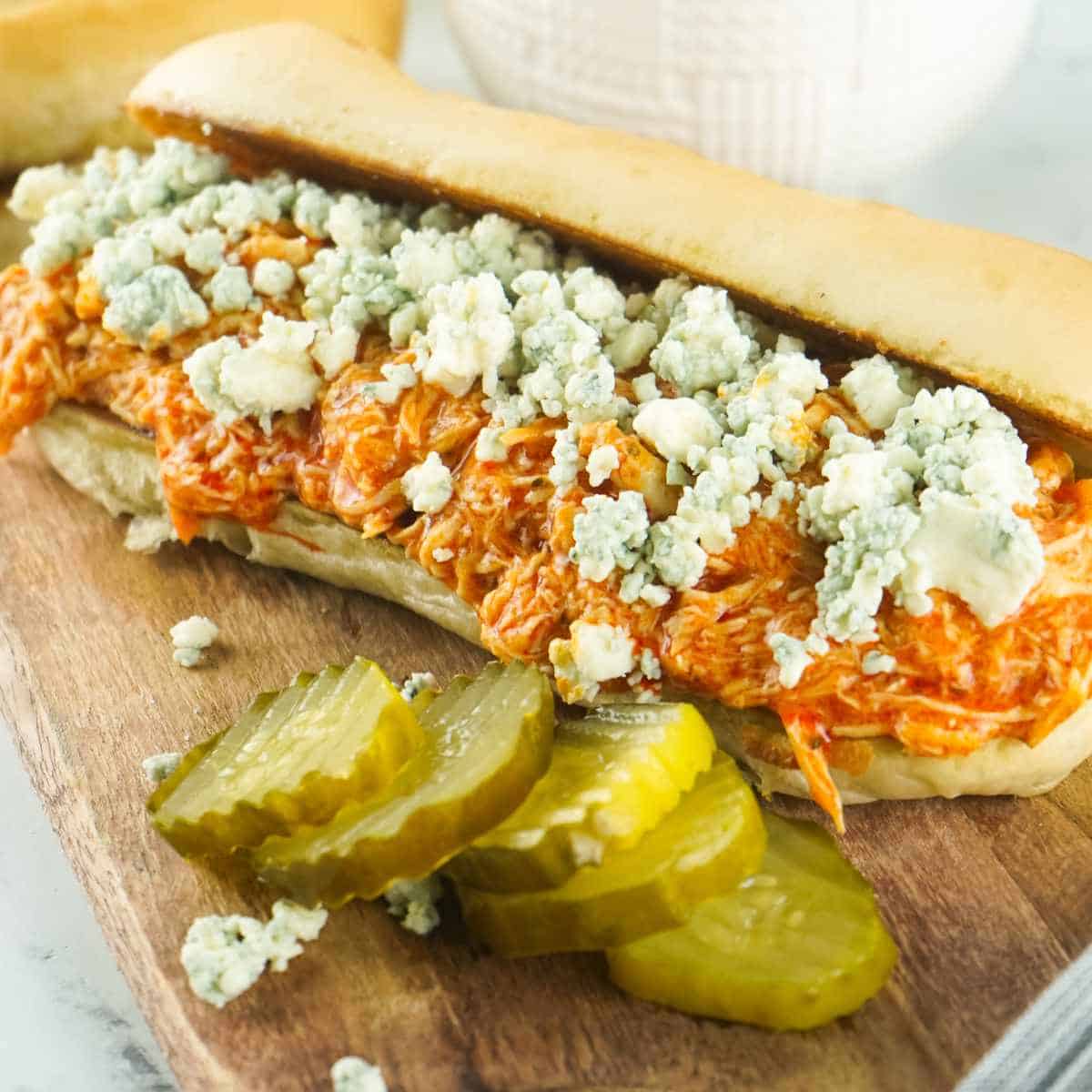 buffalo chicken filled hoagie with crumbled bleu cheese and pickles.
