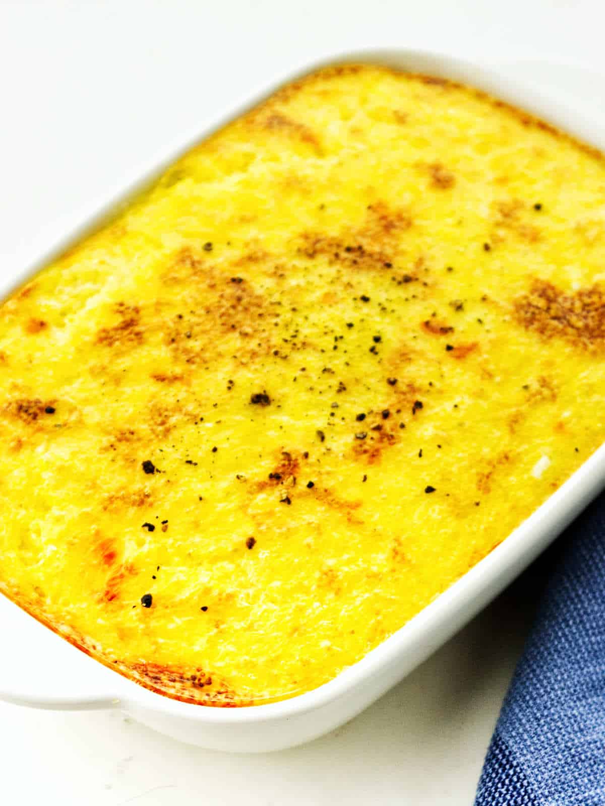 baked grits in a casserole dish.