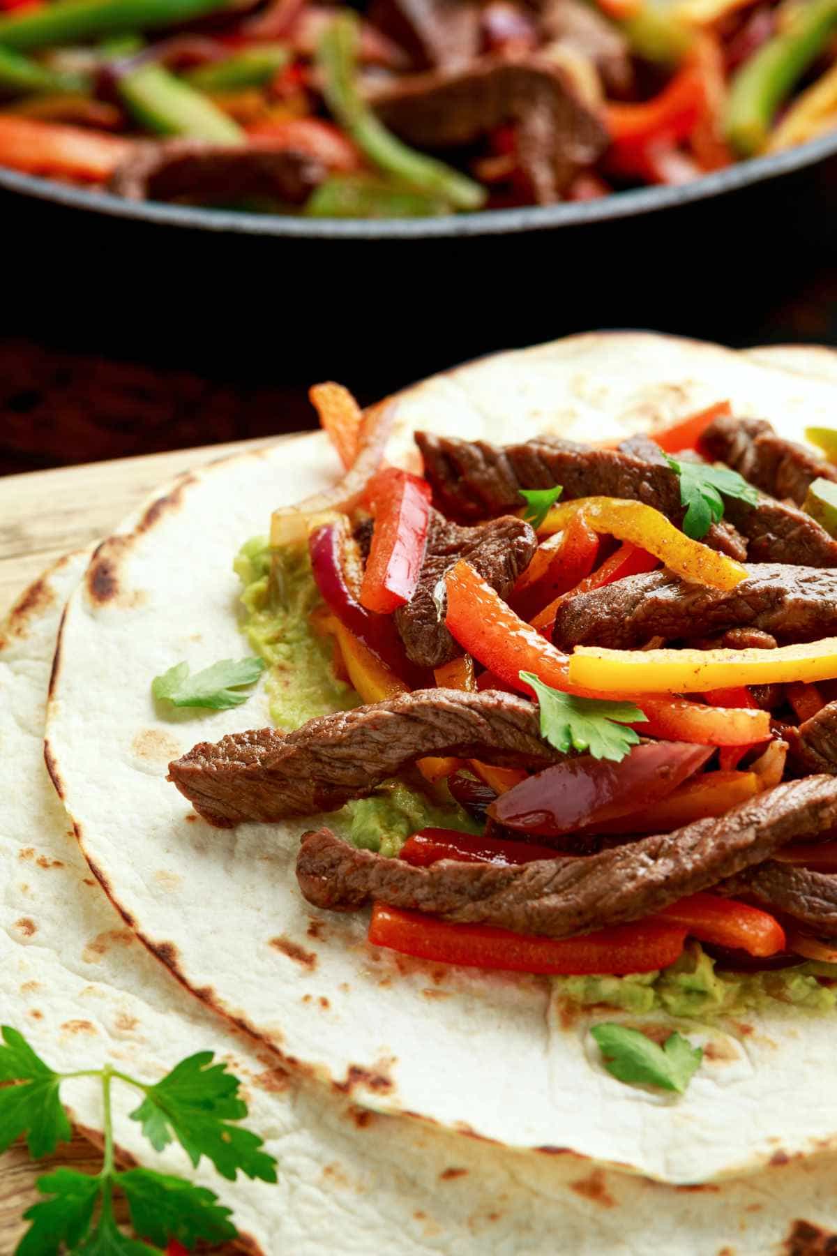 Chili's steak fajita copycat on a blue plate.