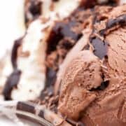 scoop of chocolate marshmallow ice cream in a sundae dish.