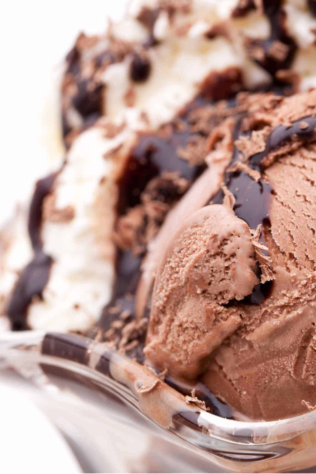 scoop of chocolate marshmallow ice cream in a sundae dish.