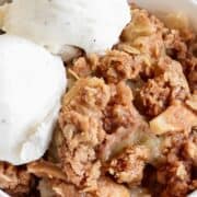 dutch oven apple crisp with ice cream.