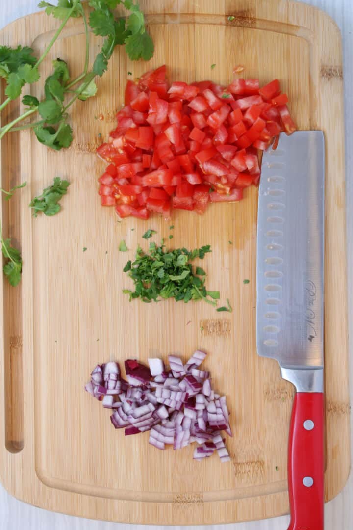 Diced tomatoes, chopped onion, and minced cilantro.