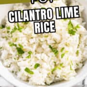 Instant Pot cilantro lime rice in a bowl with cilantro garnish and text overlay.