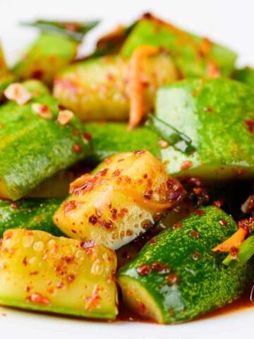 plate with cucumber salad kimchi serving.
