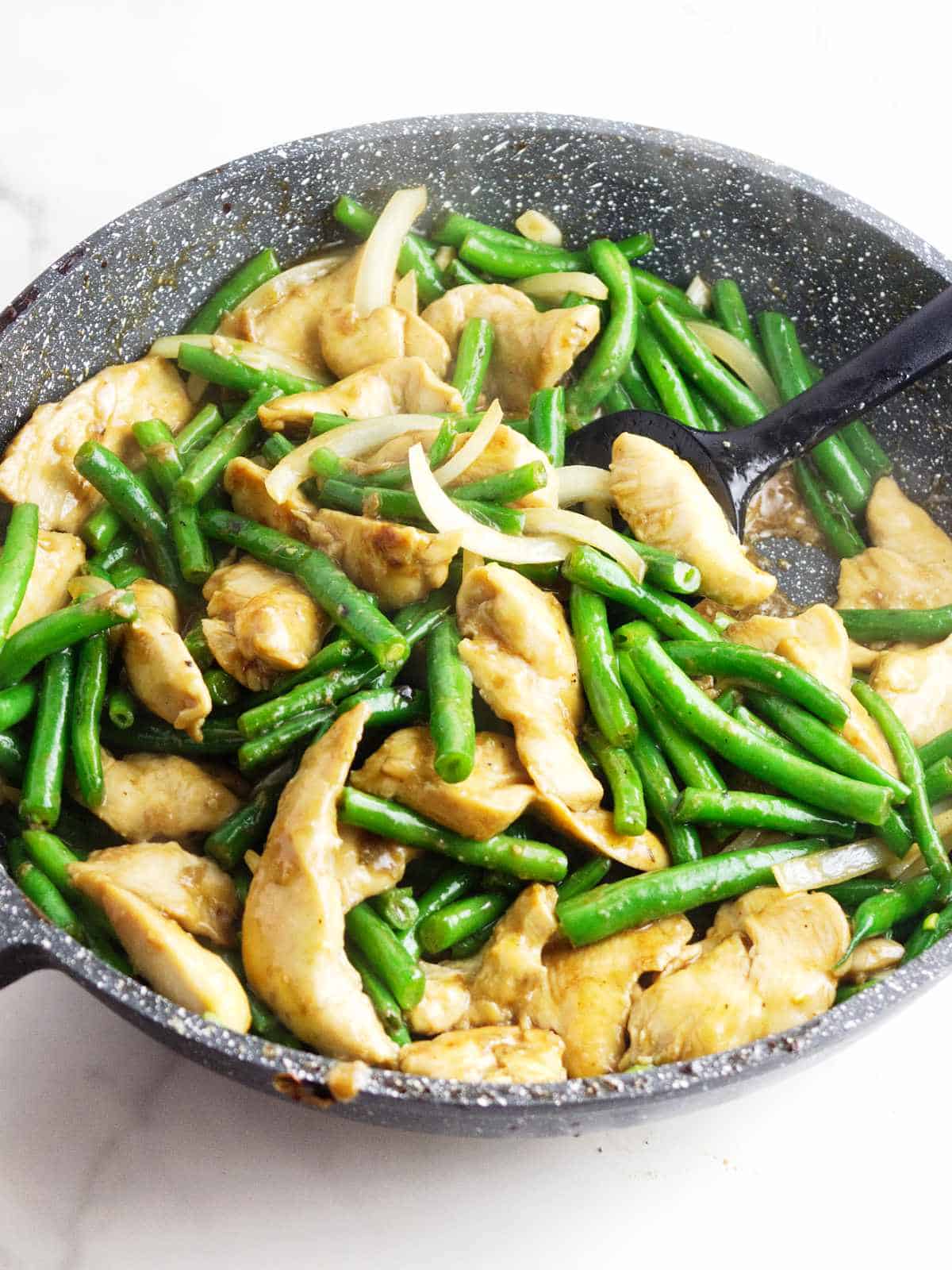 sauteed chicken tossed with sauteed green beans.