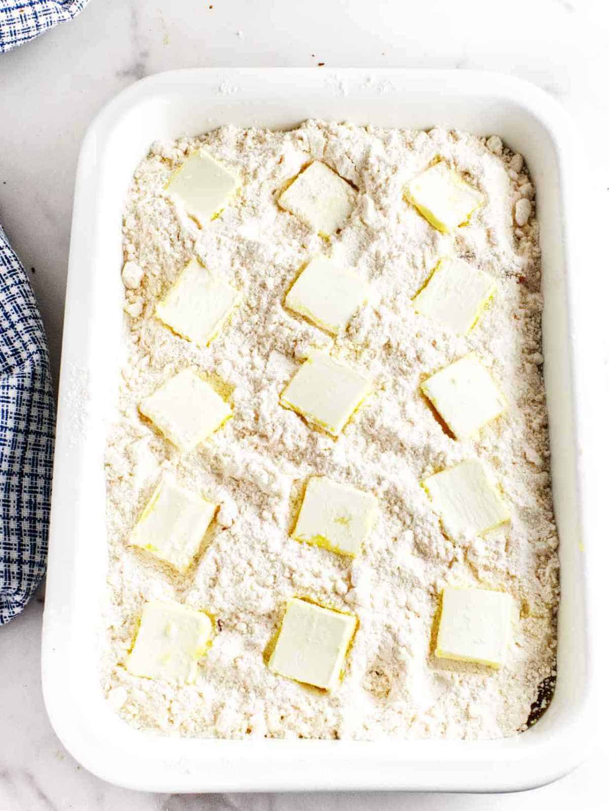 sugar, and butter in baking dish.