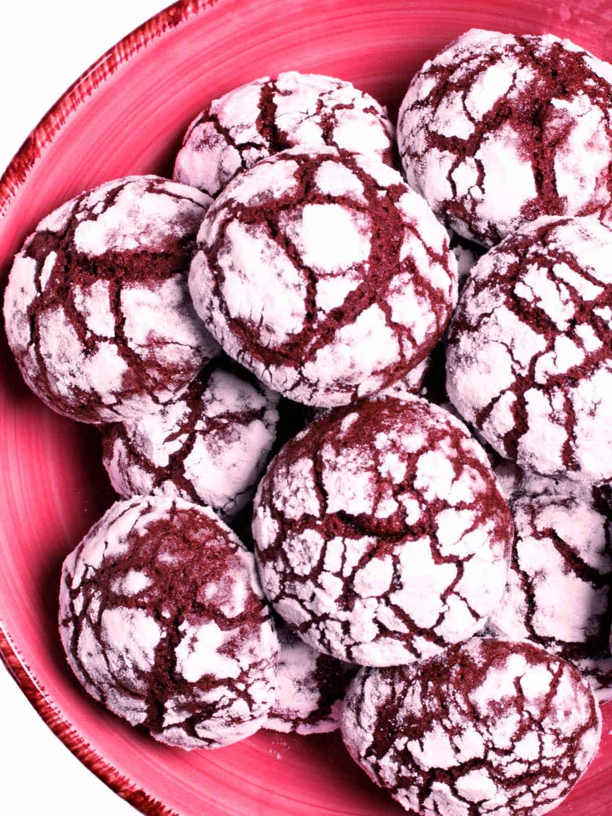 plate of red velvet crinkle cookies.