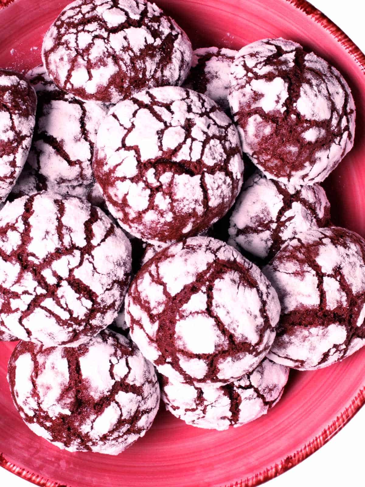 plate of red velvet crinkle cookies.