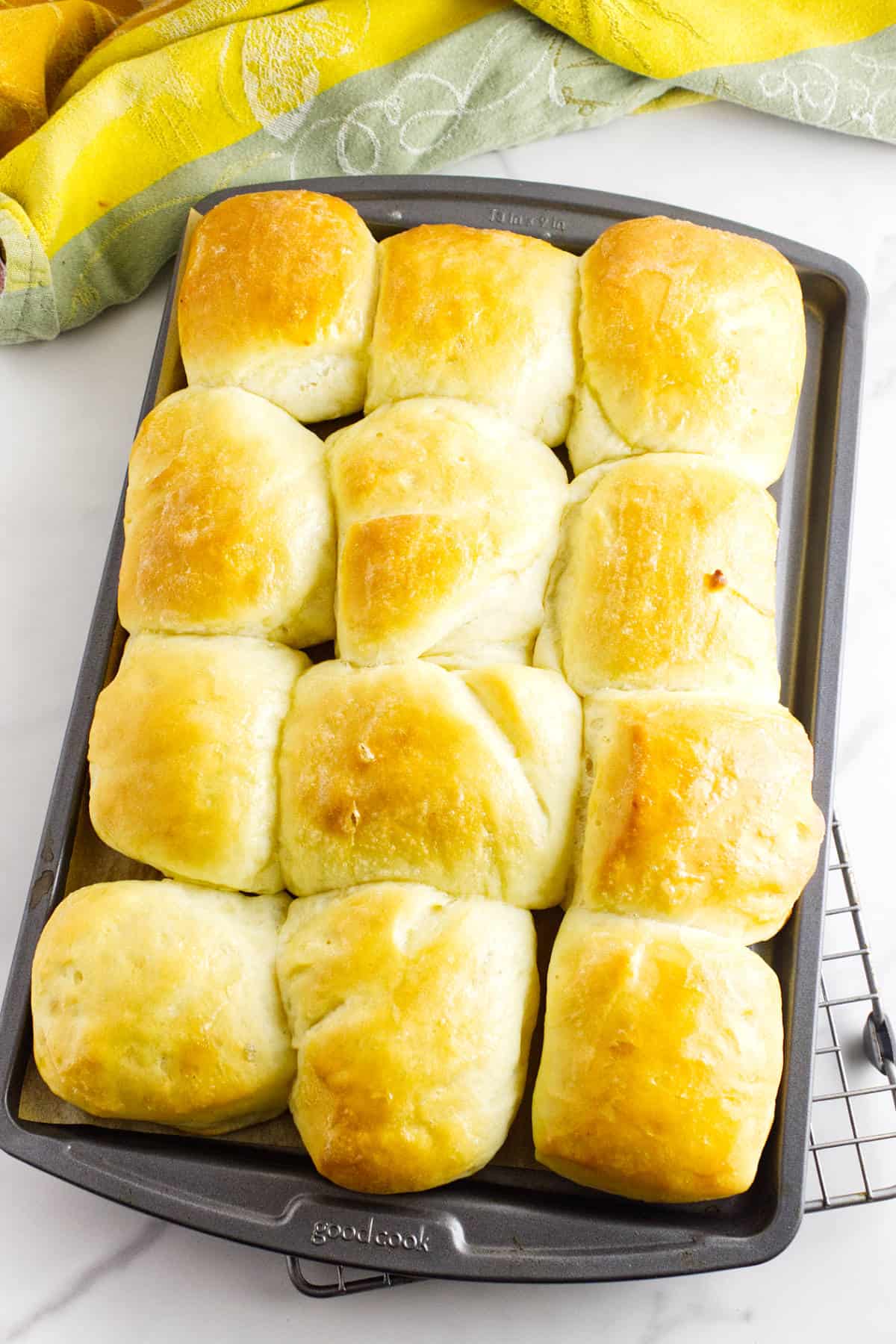Rolls baking in the oven until golden brown.