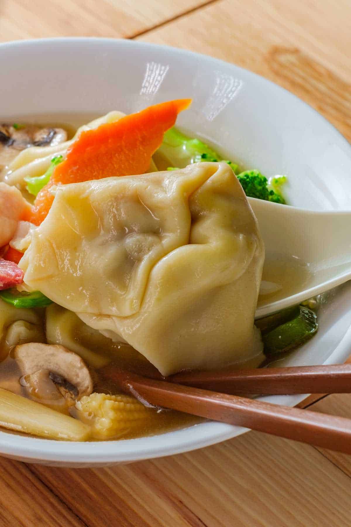 Subgum wonton soup with pork shrimp chicken and mixed Chinese vegetables.