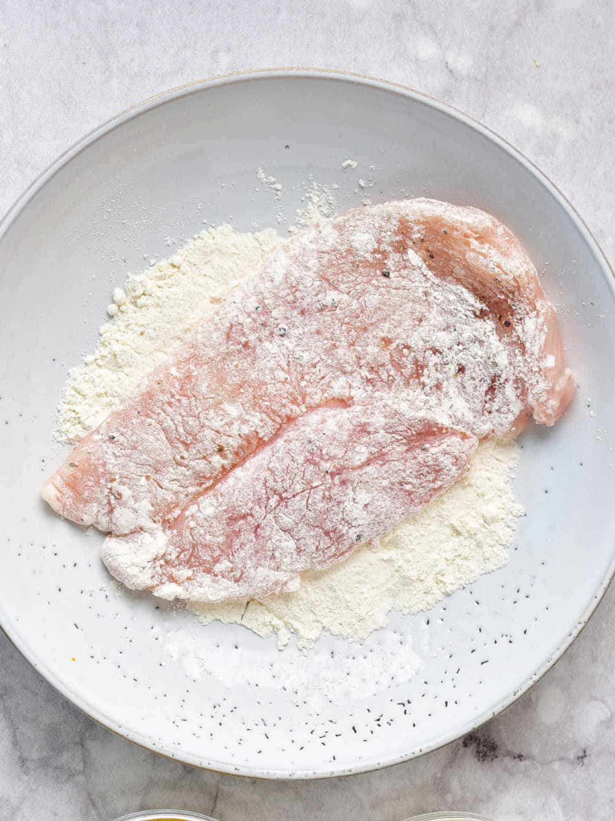chicken breast dredged in flour.