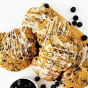blueberry cookies with icing on them.