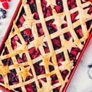 slab pie with crisscross top crust and decorative stars.