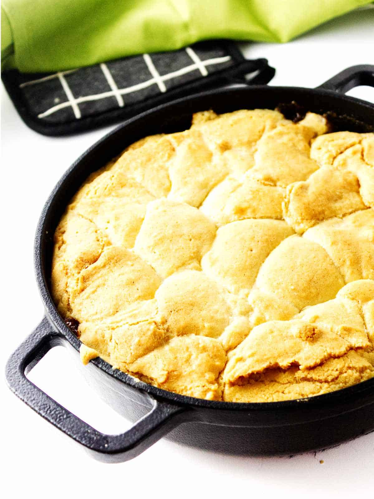 baked fruit and cake in a skillet.