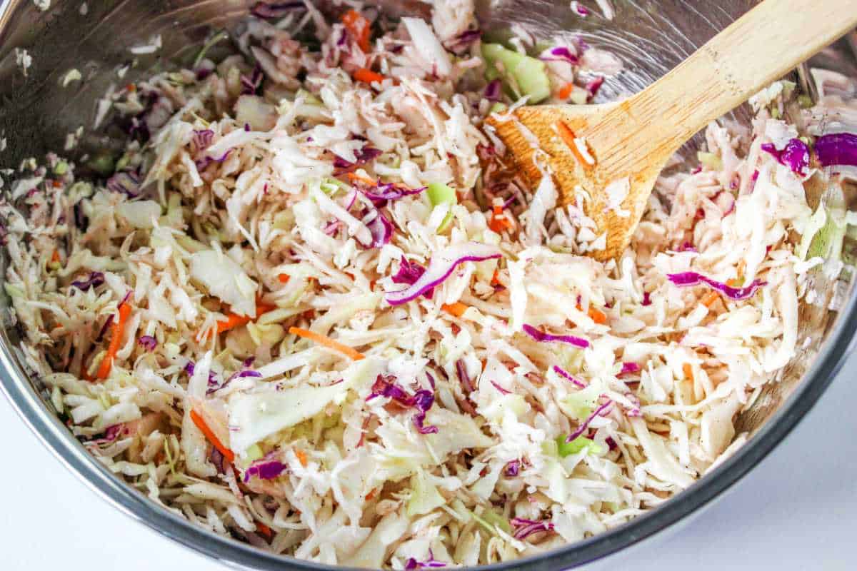 bowl of coleslaw ready to be tossed.