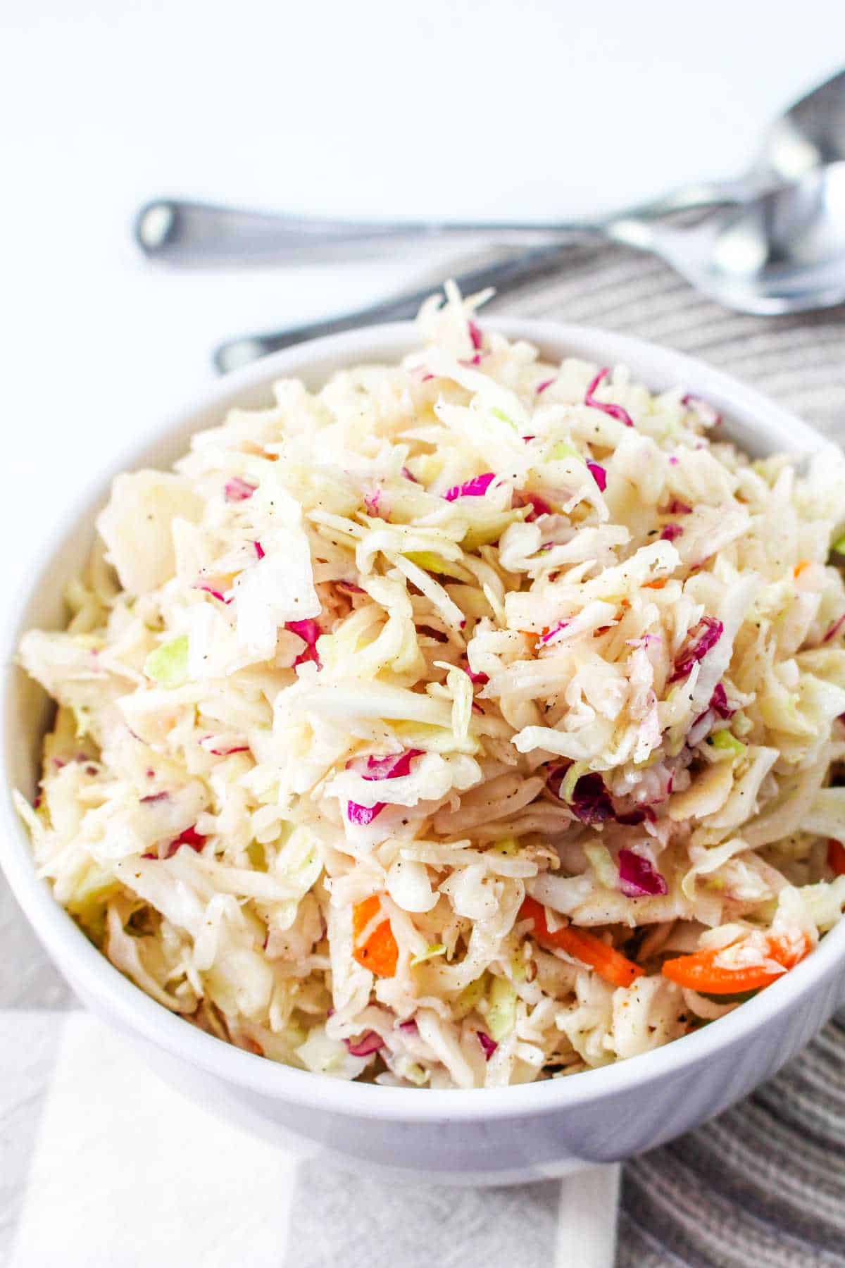 serving bowl of no mayonnaise coleslaw, Amish style.