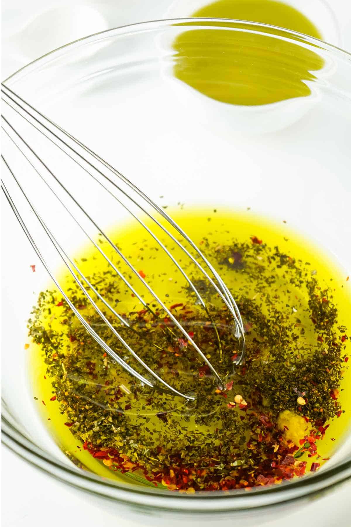whisk in a bowl of oil and seasonings.
