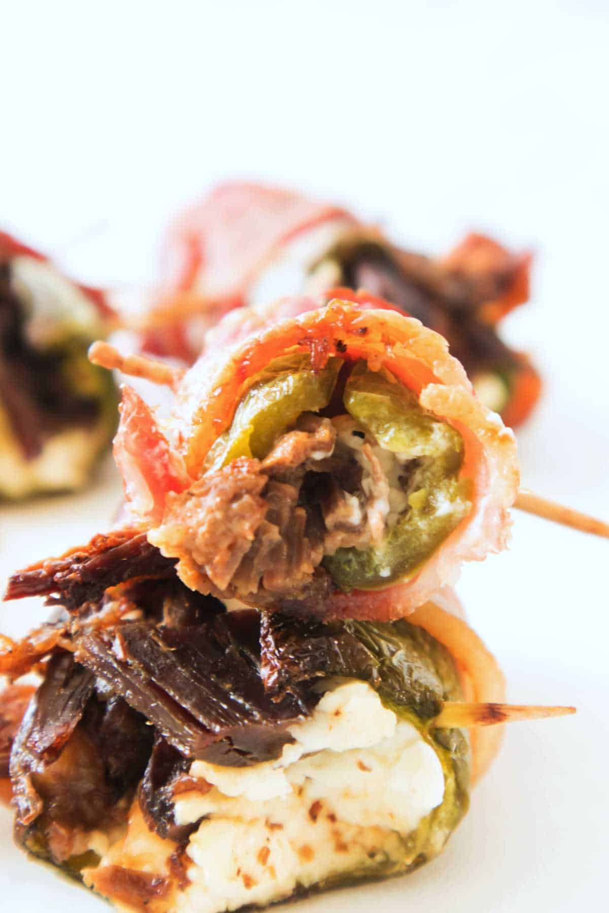 crisp bacon wrapped stuffed smoked jalapeno poppers.