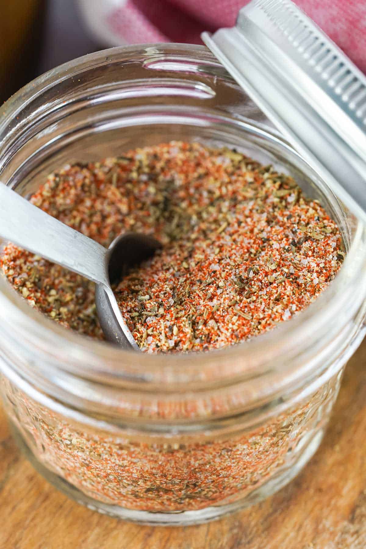 blended spices stored in a small mason jar, great for smoker recipes.