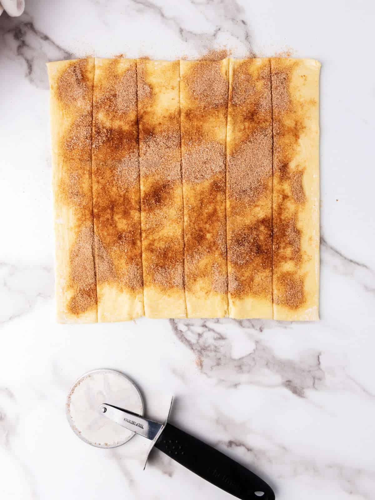 puff pastry sprinkled with cinnamon sugar and cut into strips.