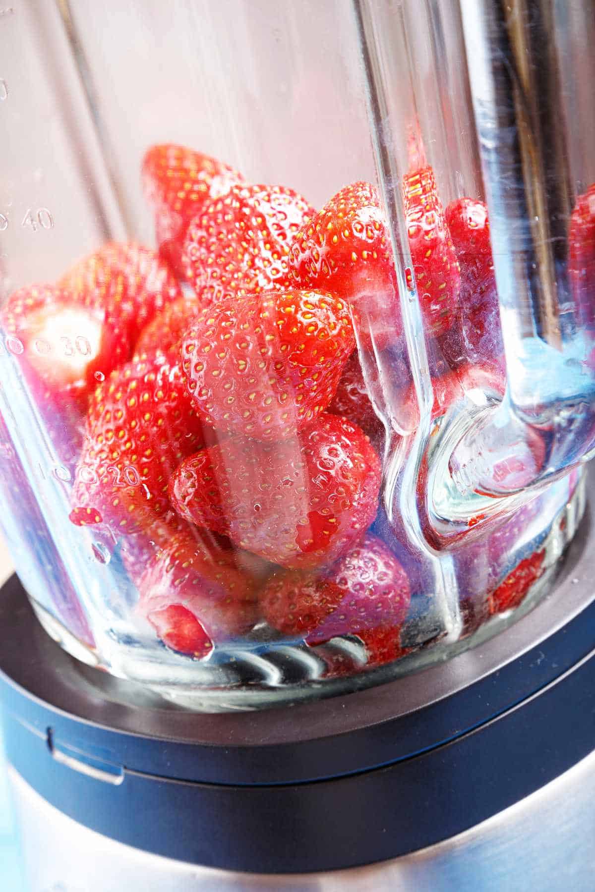 strawberries in a blender.