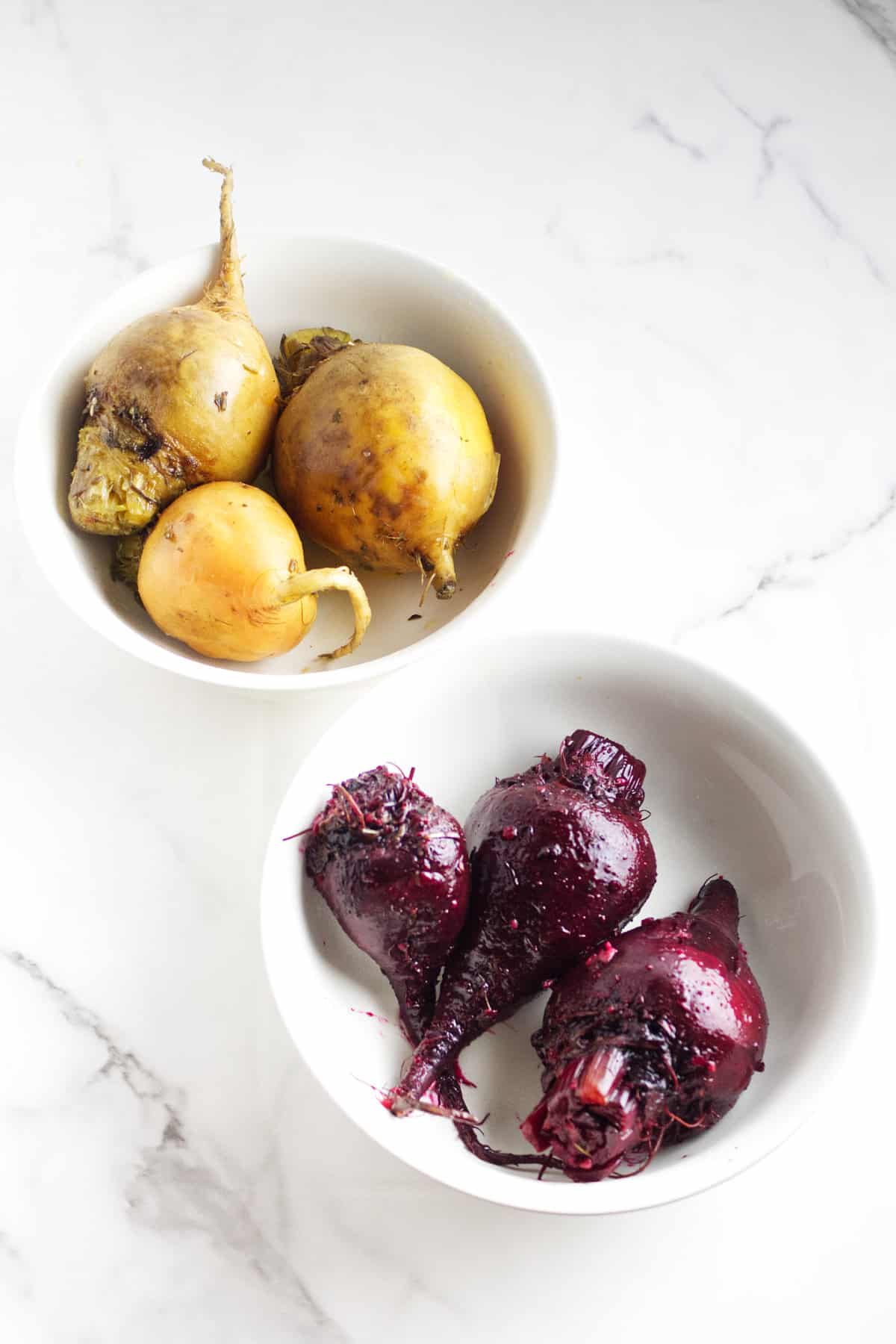 cooked beets in two bowls.