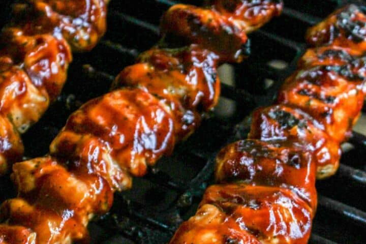 Chipotle BBQ glazed chipotle chicken kabobs on a hot grill.