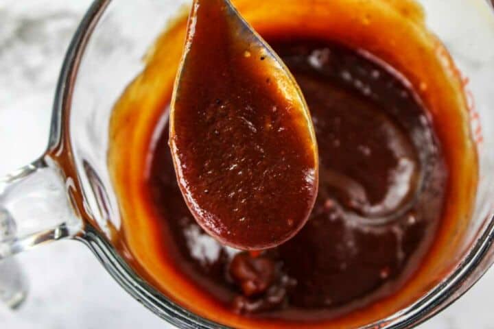 Chipotle barbecue glaze stirred together in a bowl.