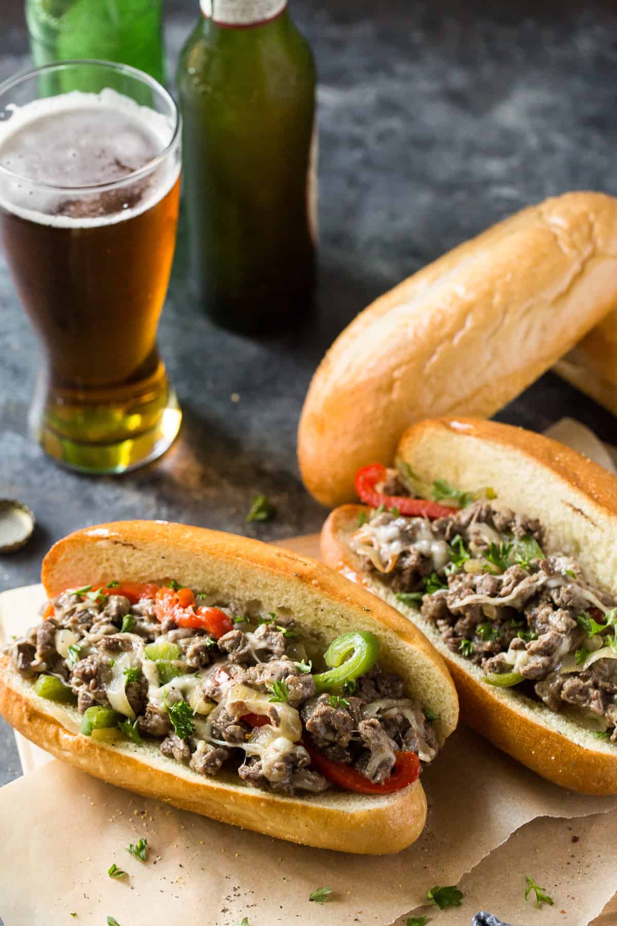 philly cheesesteaks with peppers and onions and a mug of beer for you fathers day recipes box.