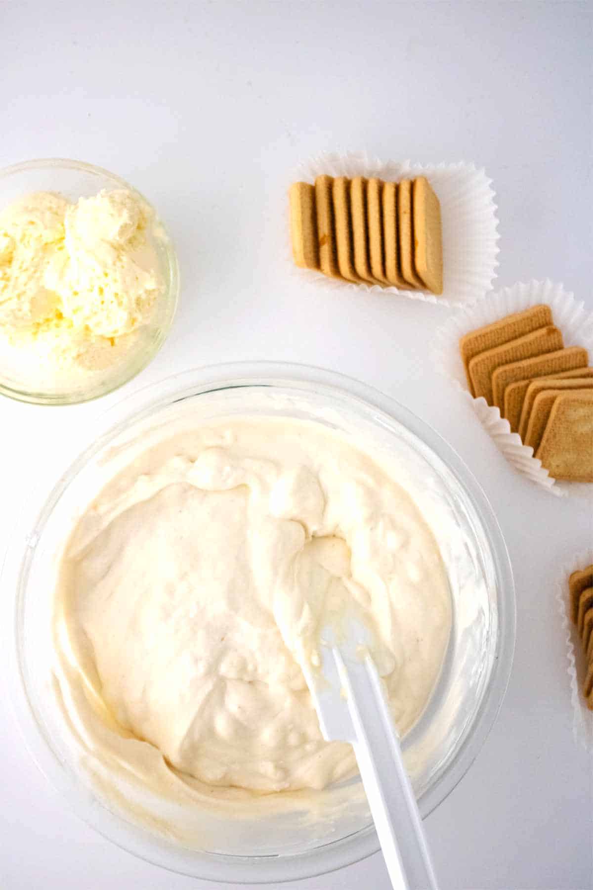 folding whipped cream mixture into sweetened condensed milk.