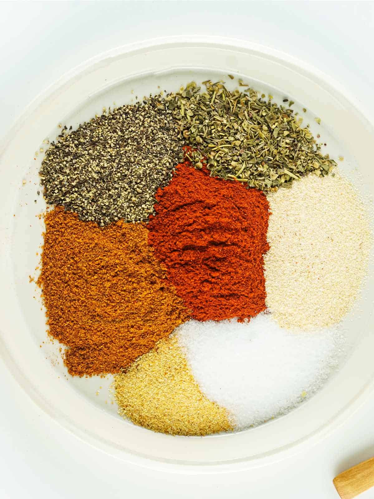 plate of colorful herbs for blending.