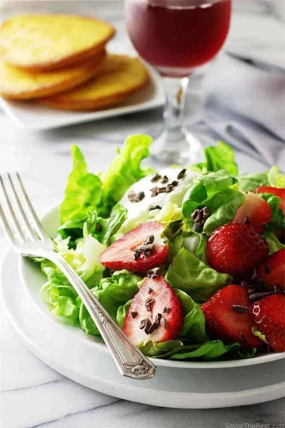 butter lettuce and strawberries salad.