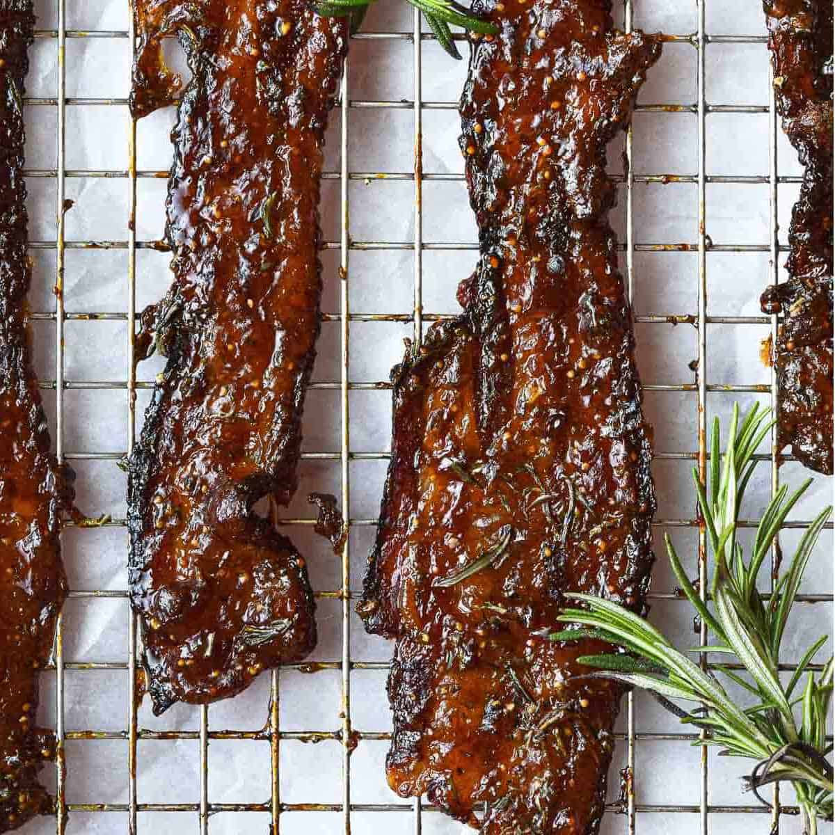 Candied bacon with rosemary.