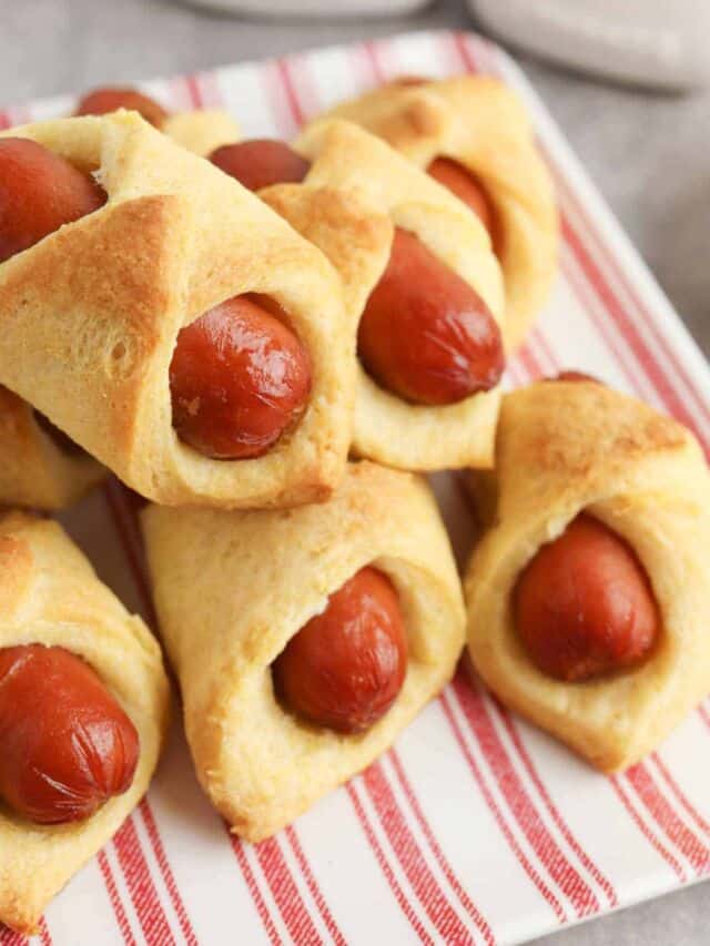 golden browned corn dog pigs in a blanket.