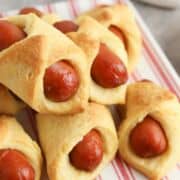 golden browned corn dog pigs in a blanket.