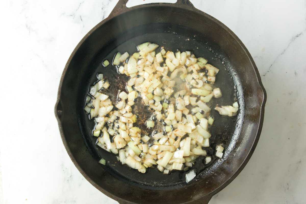 sauteed onions in a cast iron skillet.