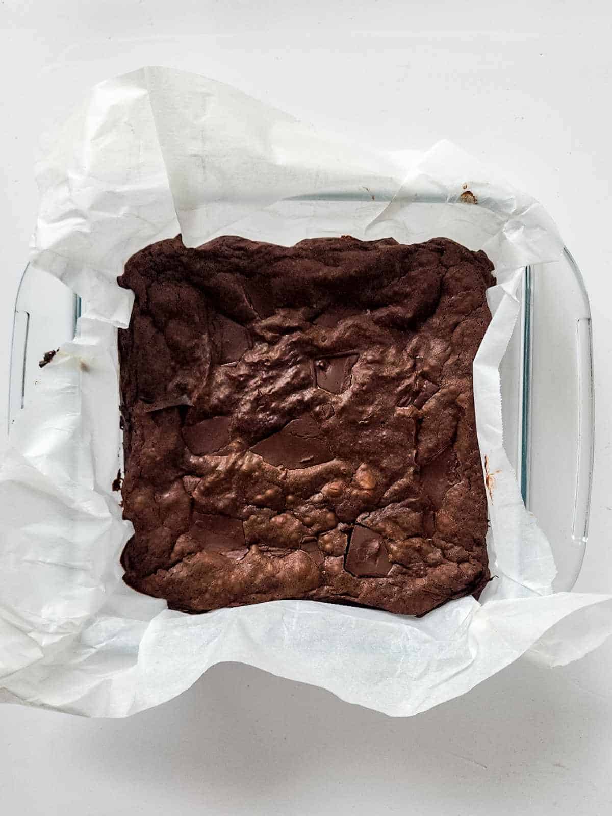 square pan with baked brownies.