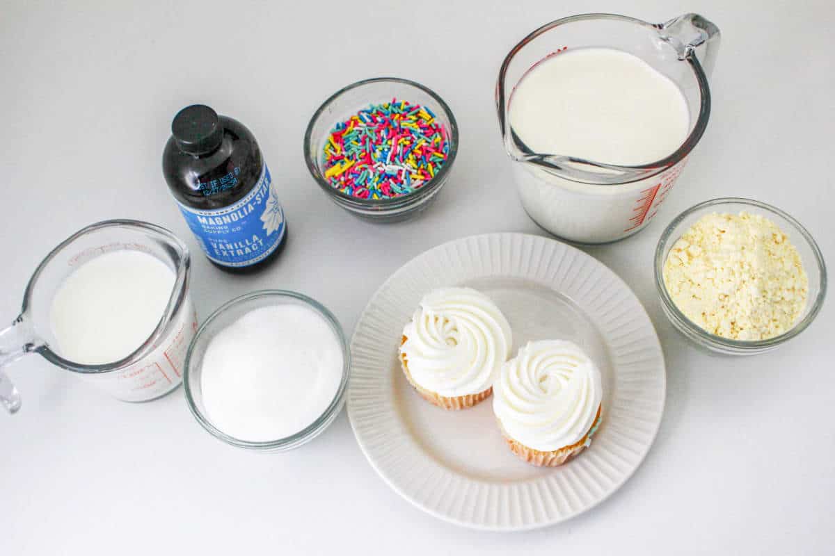 ingredients for making frozen dessert with rainbow sprinkles.